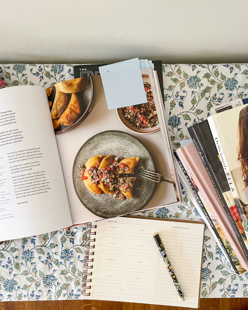 Meal Planning with cookbooks and notebook